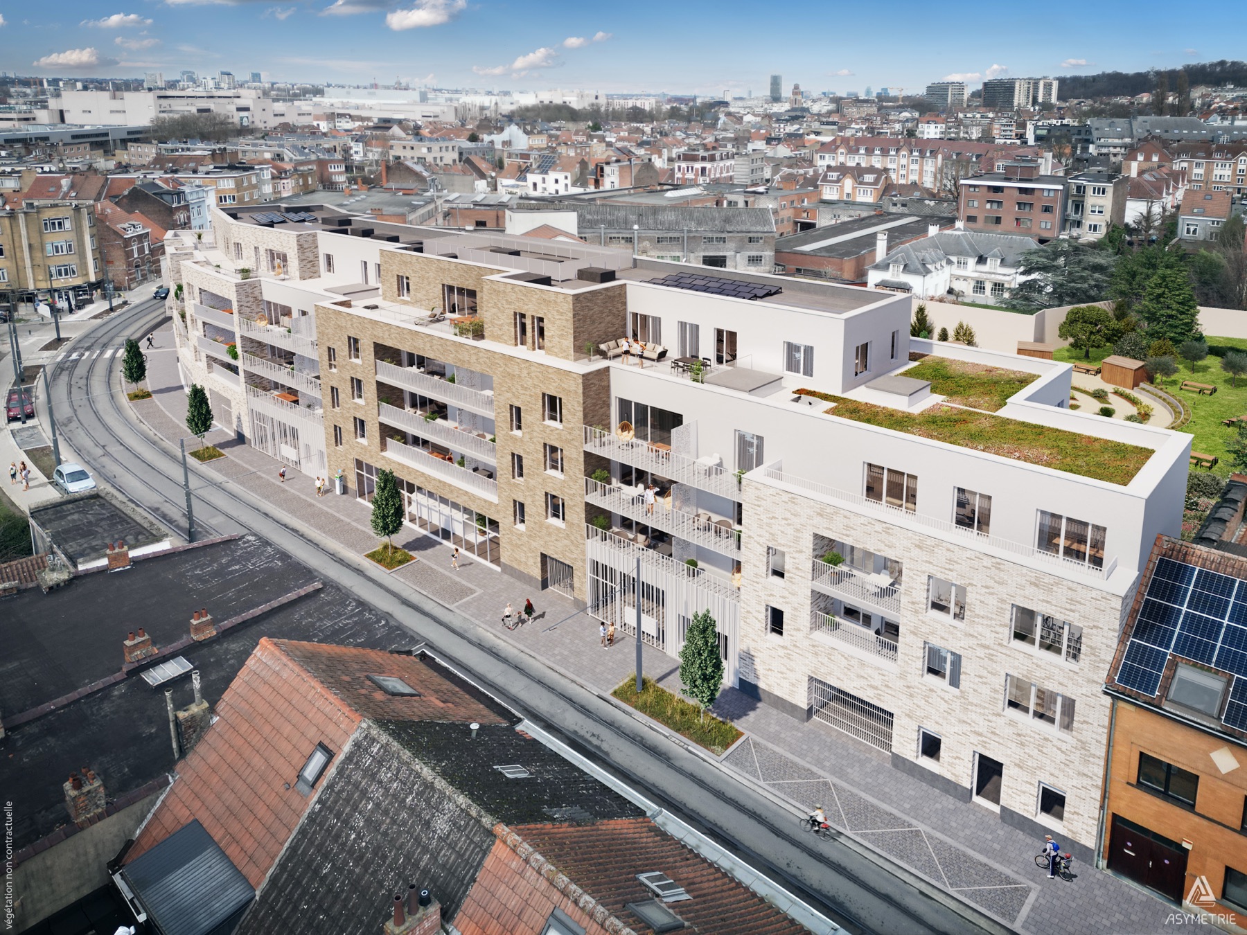 Vue aérienne de GreenForest : le nouveau bâtiment et la toiture végétalisée sur fond de skyline bruxellois.